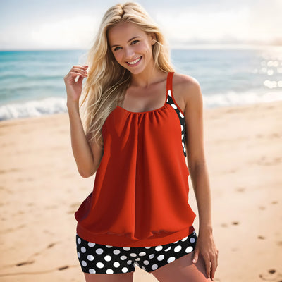 Women's two-piece swimsuit with a turquoise tankini top and black boxer bottoms with turquoise polka dots. - Image 3