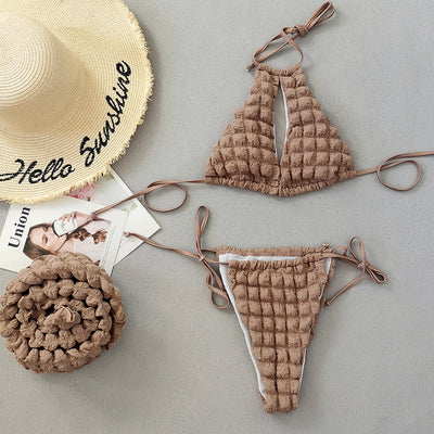 Light brown seersucker three-piece bikini swimsuit with a lace-up triangle top, tie-side bottoms, and a matching wrap skirt. - Image 2