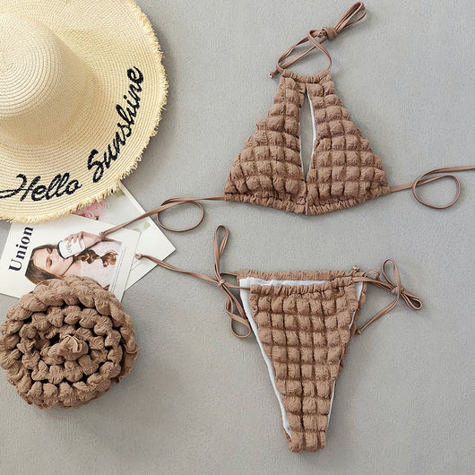 Light brown seersucker three-piece bikini swimsuit with a lace-up triangle top, tie-side bottoms, and a matching wrap skirt. - Image 2