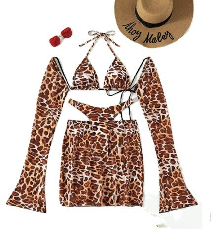 Leopard print three-piece swimsuit set with a halter bikini top, high-cut bottom, mini skirt, and detached long sleeves. - Image 6