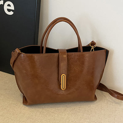 Bolso Bucket de Cuero Encerado Elegante y Portátil - Image 3