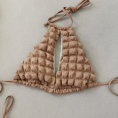 Light brown seersucker three-piece bikini swimsuit with a lace-up triangle top, tie-side bottoms, and a matching wrap skirt. - Image 3