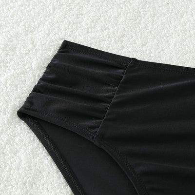 Girls' two-piece bikini swimsuit with a colorful striped crop top and solid black high-waisted ruched bottoms. - Image 8