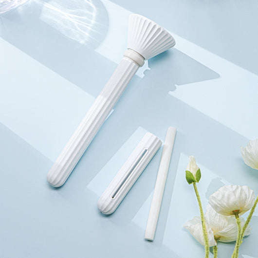 Beige and white USB ultrasonic humidifier with a fluted conical top and a cylindrical body with a water level window. - Image 4