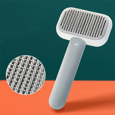 Cepillo Desmudante de Acero Inoxidable para Perros y Gatos con Masaje - Image 4