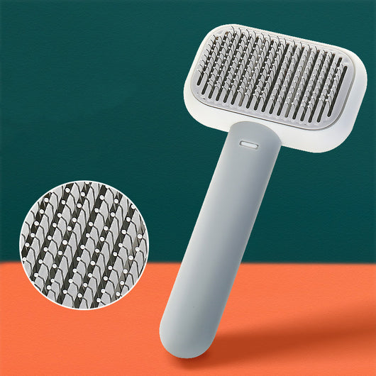 Cepillo Desmudante de Acero Inoxidable para Perros y Gatos con Masaje - Image 4