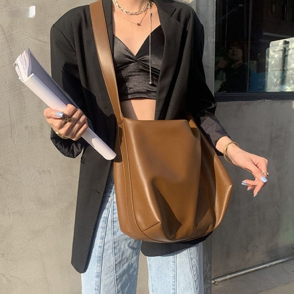 Bolso de Hombro Único en Tela Suave - Diseño Moderno y Versátil