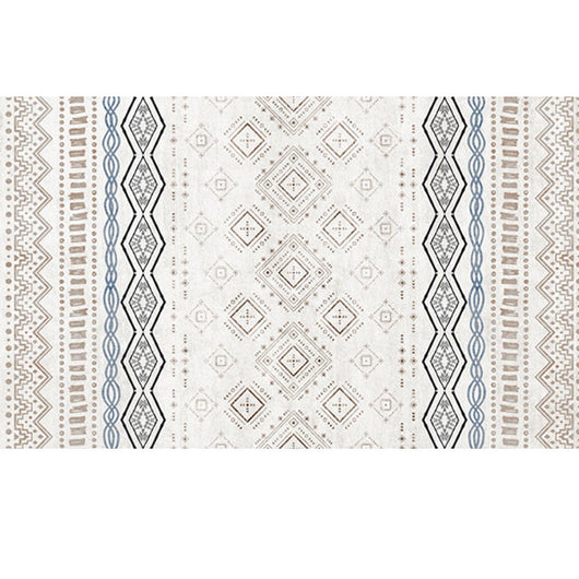 Rectangular area rug with white background and horizontal stripes of black, teal, and yellow tribal patterns. - Image 37