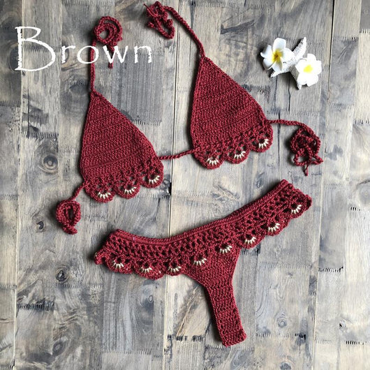 Lake green handmade crochet bikini set with gold beads, featuring a triangle top and thong bottom on wood. - Image 8