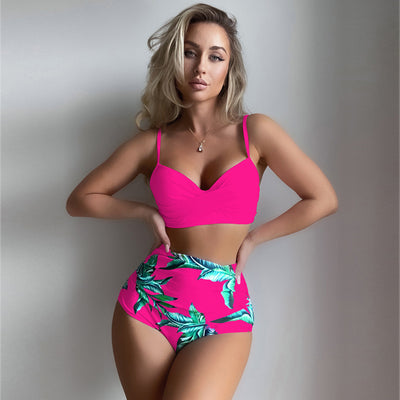Woman wearing a bright yellow push-up bikini top and high-waisted bottoms with a green tropical leaf print. - Image 7