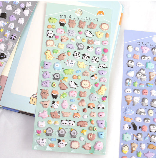Six sheets of cartoon animal foam particle stickers in various colors and themes, including clouds, food, ghosts, forest animals, and penguins. - Image 10