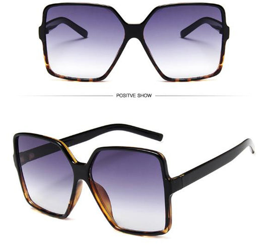 Oversized square sunglasses with a black and tortoiseshell frame and gradient purple lenses, shown from two angles. - Image 3