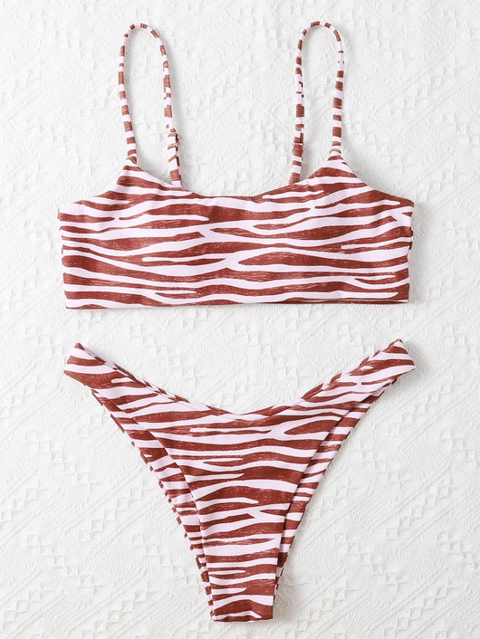 Tan and white zebra stripe two-piece bikini with a bandeau top and high-cut bottom, laid flat. - Image 22