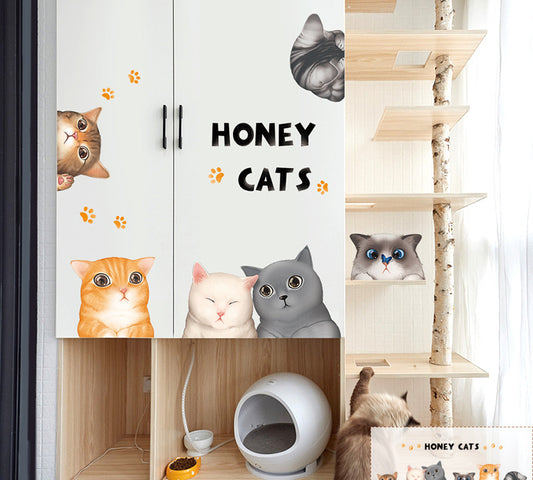Cartoon cat wall sticker featuring multiple playful cats, one reaching for a fish, with "I LOVE FISH" text.