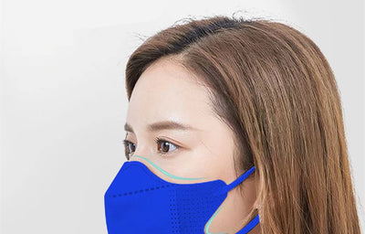 Peach disposable 3-layer face mask with perforated details worn by a person, offering comfortable daily protection. - Image 18
