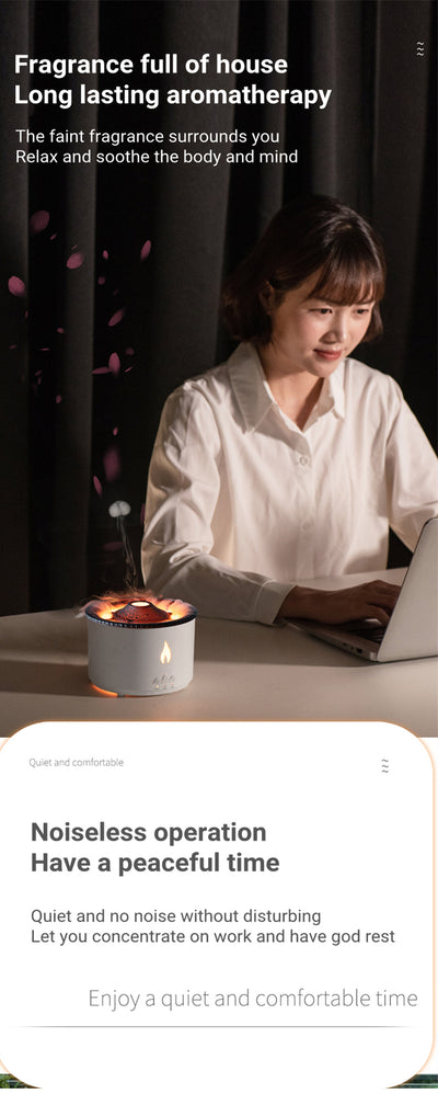 White ultrasonic essential oil diffuser with orange flame effect mist, alongside a gift set of Lavender, Peppermint, Tea Tree, and Sweet Orange essential oils. - Image 16