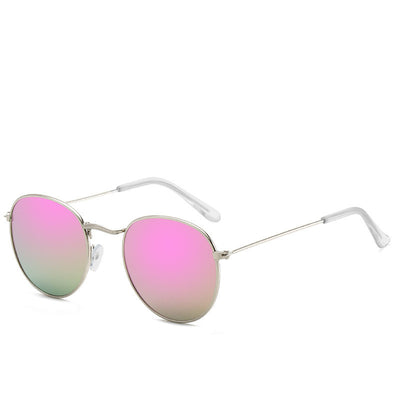 Round gold-framed sunglasses with pink tinted lenses, featuring clear temple tips. - Image 12