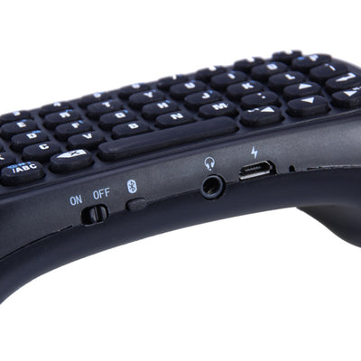 Black wireless keyboard attachment for PS4 game controller, featuring a full QWERTY layout and 3.5mm audio jack. - Image 2