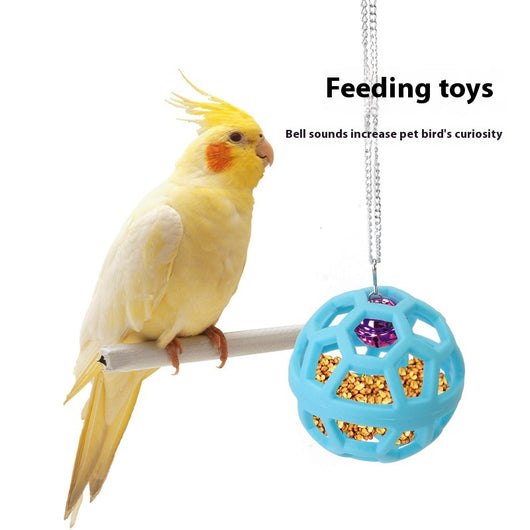 Orange hollow rubber ball bird toy with a pink bell inside, hanging from a silver chain and carabiner clip. - Image 4