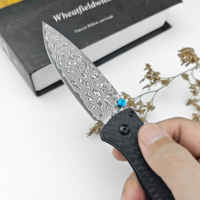 Cuchillo Portátil Butterfly BM535 Damasco con Funda de Cuero - Image 2