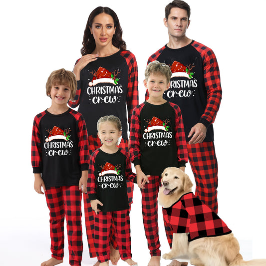 Kids' Christmas pajama set with a black "Christmas Crew" top and red and black buffalo plaid pants.