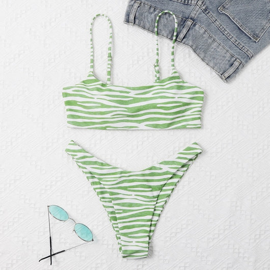 Tan and white zebra stripe two-piece bikini with a bandeau top and high-cut bottom, laid flat. - Image 21
