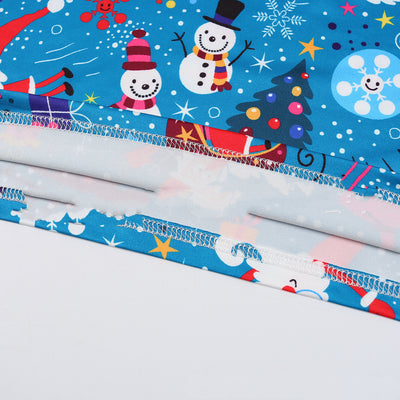 Matching family Christmas pajamas in blue with Santa, snowman, and gift print. Includes adult sets, kids' sets, and a baby romper. - Image 4