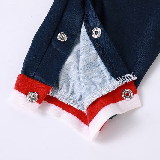 Navy blue long-sleeve pajama romper with red and white striped sleeves and a cartoon Santa Claus print. - Image 2