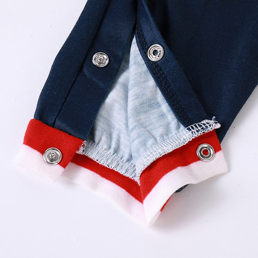 Navy blue long-sleeve pajama romper with red and white striped sleeves and a cartoon Santa Claus print. - Image 2