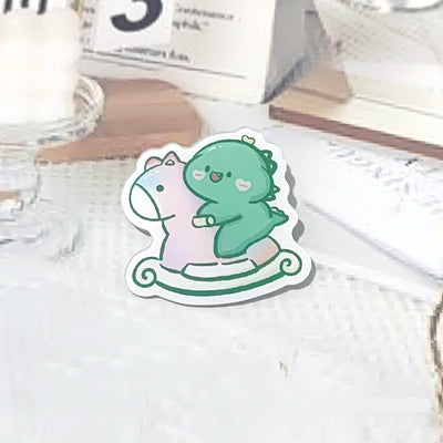Cute green cartoon dinosaur acrylic badge brooch with a shy expression and small spikes on its back. - Image 28