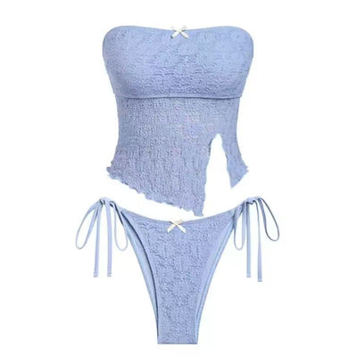Light blue textured two-piece bikini with a strapless top and high-cut bottom with side ties and white bows. - Image 7