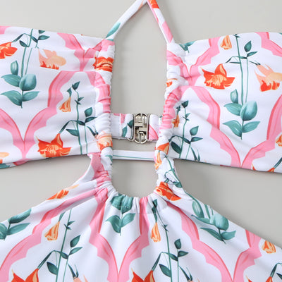 Dark green floral one-piece swimsuit with halter neck, bandeau top, cut-outs, and matching sheer sarong. - Image 25