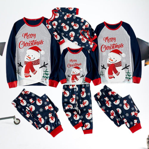 Matching family Christmas pajamas with dark blue long-sleeve tops, light gray fronts, and a snowman graphic. - Image 3