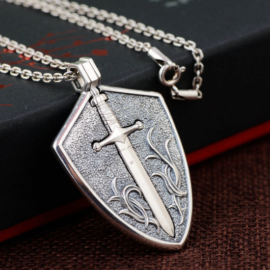Pendiente Espada y Escudo para Hombre - Joya de Acero Inoxidable