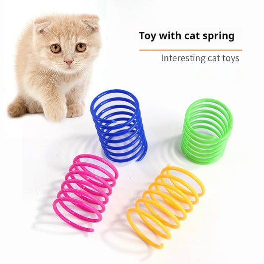 Colorful plastic spring cat toys in pink, yellow, green, and blue, packaged in a clear plastic bag. - Image 2