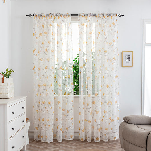 Sheer white mesh curtains with purple and light blue floral patterns, hung on a black rod in a bright room. - Image 13