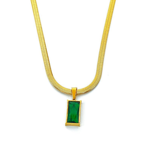 Gold hoop earrings with rectangular emerald green zircon pendants, displayed on a light beige fabric. - Image 5