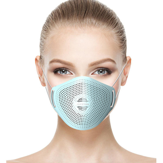 Light blue dust mask with perforated design and central breathing valve, worn by a woman. - Image 2
