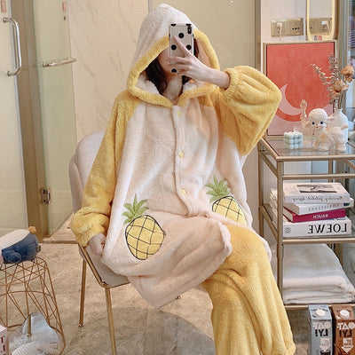 Cream and yellow thick flannel hooded pajama set with pineapple appliques, worn by a person sitting indoors. - Image 9