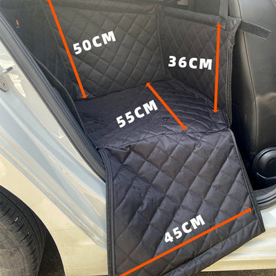Golden retriever in a dark grey quilted pet car seat, secured in the back seat of a car. - Image 2