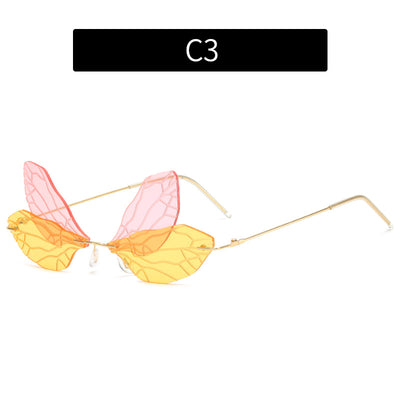 Light green rimless butterfly sunglasses with gold metal frames, featuring a unique veined lens design. - Image 7