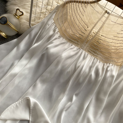 Blusa Elegante Plisada con Malla Transparente y Detalles Perlados - Image 2