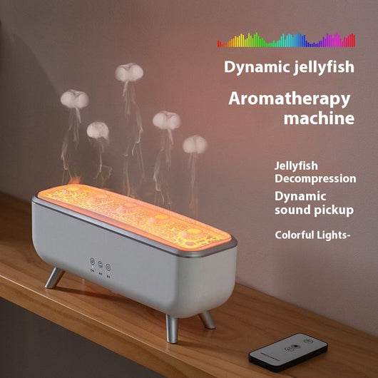 White rectangular ultrasonic humidifier with a textured top, silver legs, and control icons for mist, rotation, and light. - Image 3