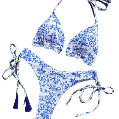 Women's blue and white porcelain print halter bikini with tie-side bottoms and blue tassels. - Image 5