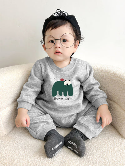 Matching cream crew neck sweatshirts, one adult and one child size, with a dark green bear graphic and "Boner bear" text. - Image 6