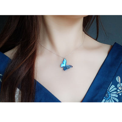 Hilo de Oreja Mariposa Azul en Plata de Ley S925 con Perla Larga - Image 7