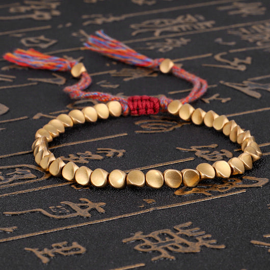 Pulsera Tibetana Budista Trenzada con Cuentas de Cobre - Brazalete de Cuerda de la Suerte