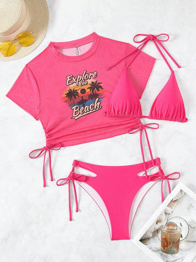 Black three-piece swimsuit with a mesh crop top featuring an "Explore the Beach" graphic, bikini top, and high-waisted bottoms. - Image 7