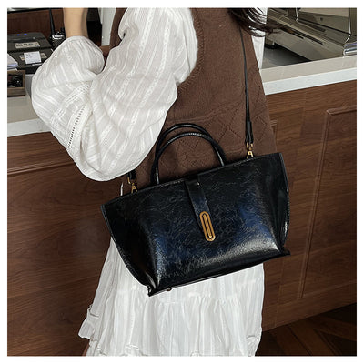 Bolso Bucket de Cuero Encerado Elegante y Portátil - Image 28