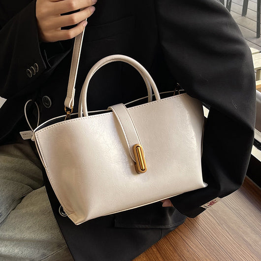 Bolso Bucket de Cuero Encerado Elegante y Portátil - Image 4